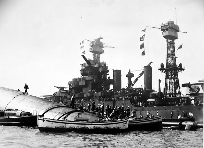 USS-Oklahoma-Battleship-Pearl-Harbor-History-14 a large ship in a body of water