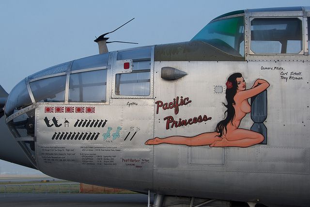631d12121c6e266a231d7f769c86773c a airplane that is sitting on a bus