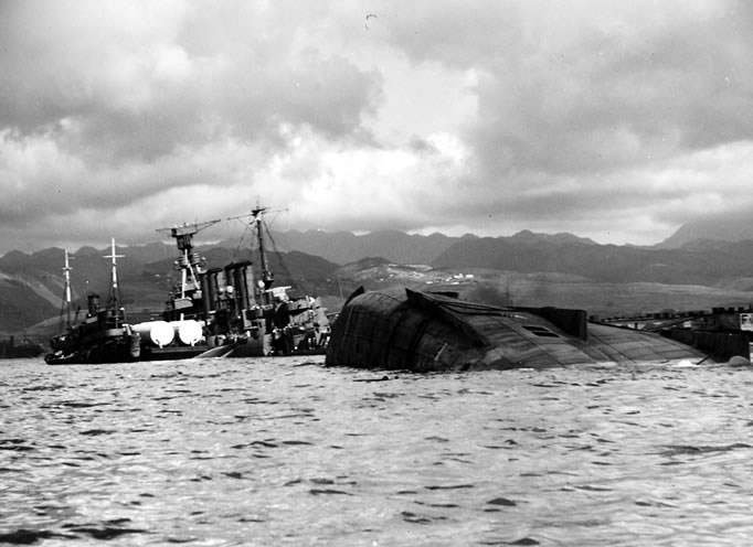 USS-Utah-Pearl-Harbor-History-4 a group of people in a boat on a body of water