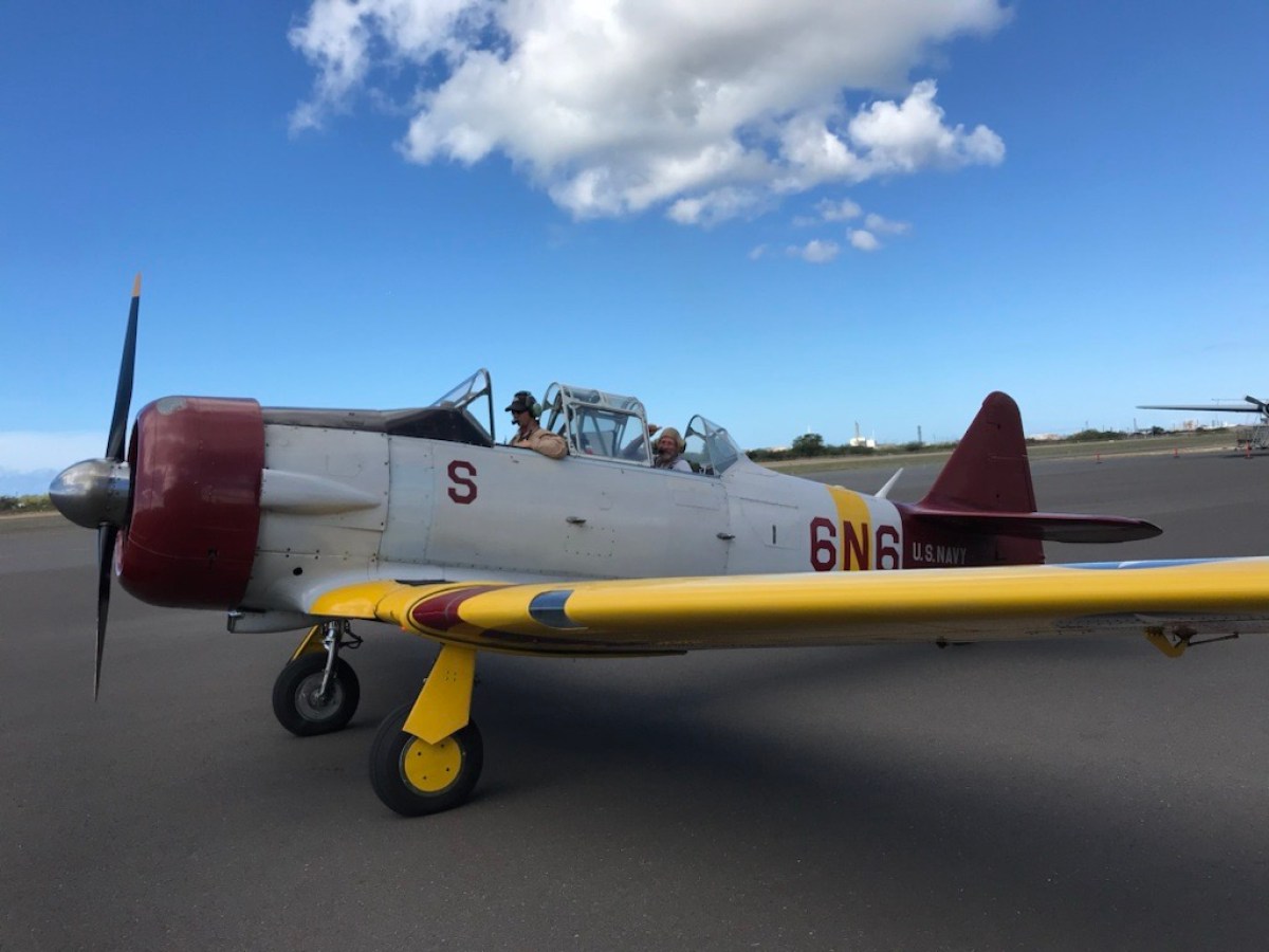 a fighter jet sitting on top of a runway