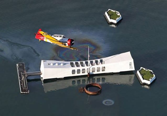 pearl-harbor-warbird-e1527188681193 a small boat in a body of water